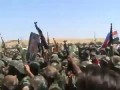 Сирийские солдаты под российскими флагами