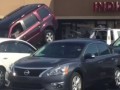 Guys tries to free his SUV from tow truck