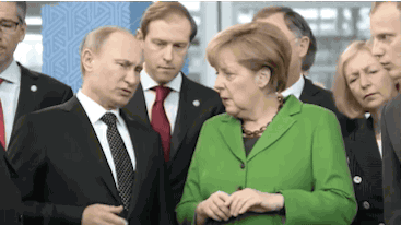 Путин и меркель