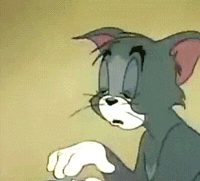 kot_tom_prosnuvshis_pitaetsja_otkrit_glaza_prikleivaja_veki