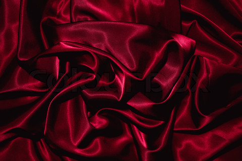 Texture of a red silk closeup