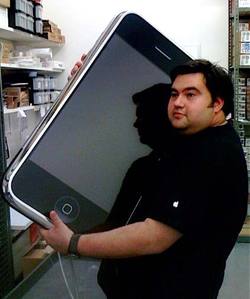 genius_holding_iphone