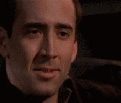 Nicholas-Cage-Cant-Hold-Back-The-Laughter-Reaction-Gif