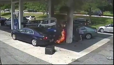 Off Duty Cop Pulls Man From Fiery Gas Station Crash