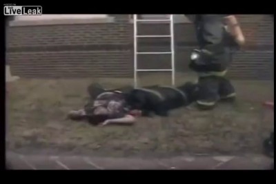 Firefighter rescuing victim takes a bad fall