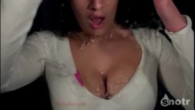 Balloon with water in slow motion on boobs