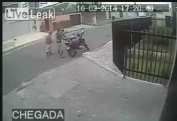 robber take a motorbike - gun in face