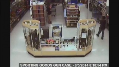 Walmart surveillance video shows shopper John Crawford III 'swatted' while talking on phone