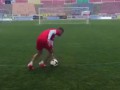 Spin around the ball 13 times without taking your eyes away and then try to score...