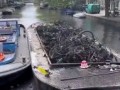 Чистка каналов в Амстердаме