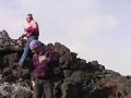 Lava run: man runs over glowing lava flow on volcano Etna