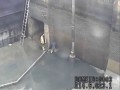 Shock video of two workers overwhelmed by water